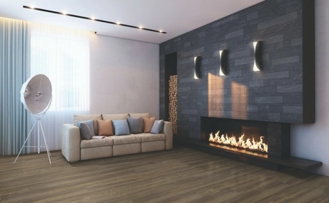 hardwood flooring in living room with fireplace